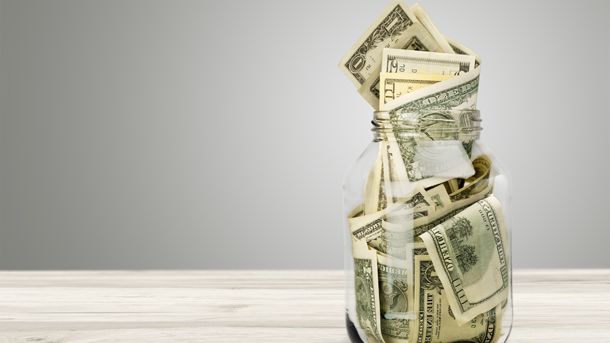 Currency in a glass jar